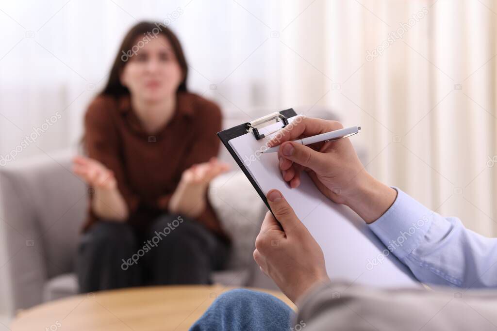 Psicoterapeuta durante un colloquio